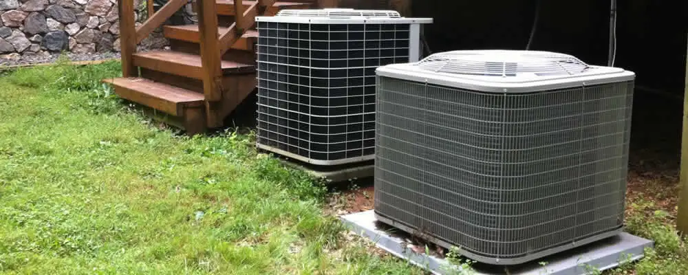 Heat pump installation and service units outside a home in Norton, MA